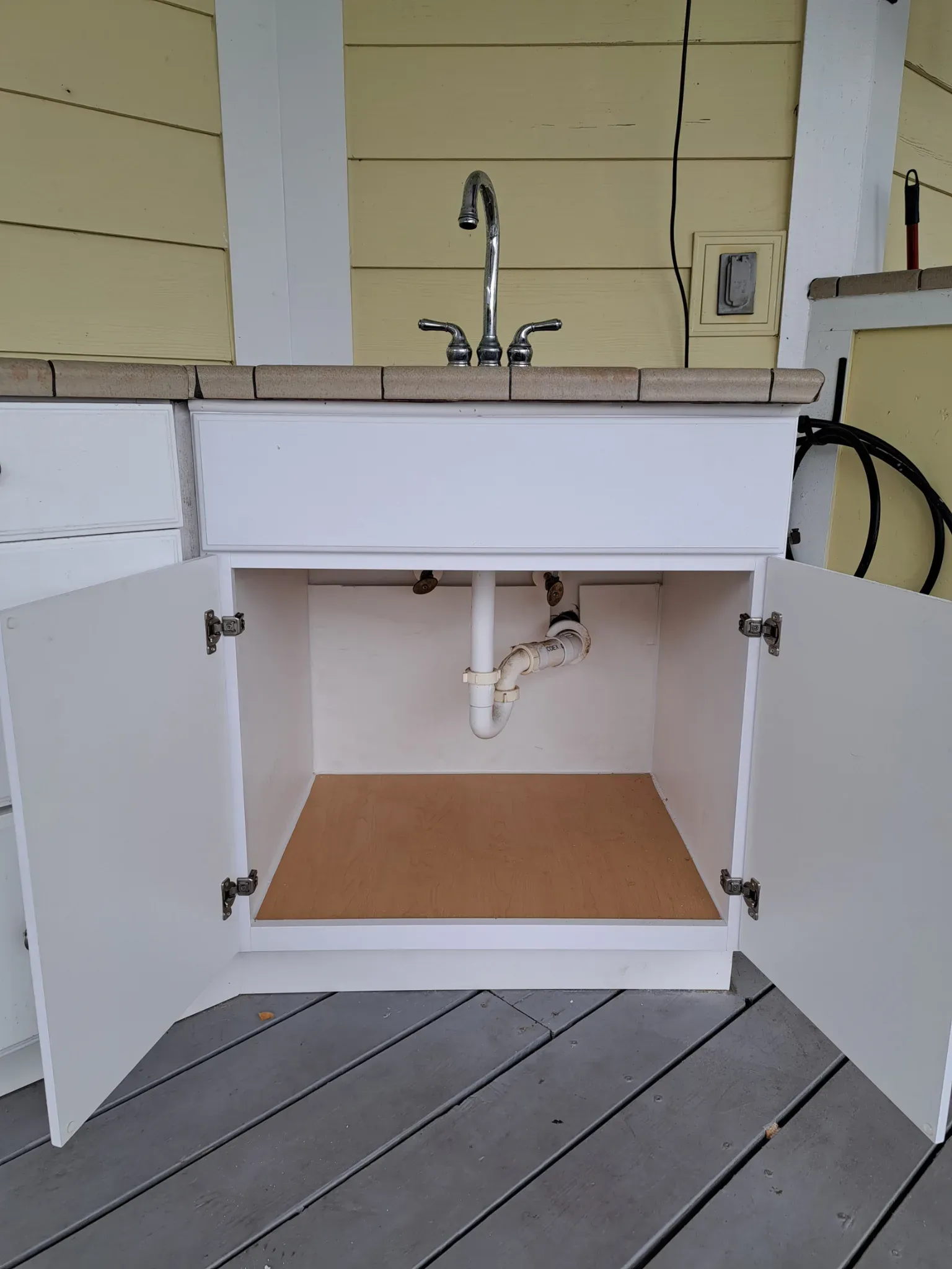 Cabinet repair/replacement — after