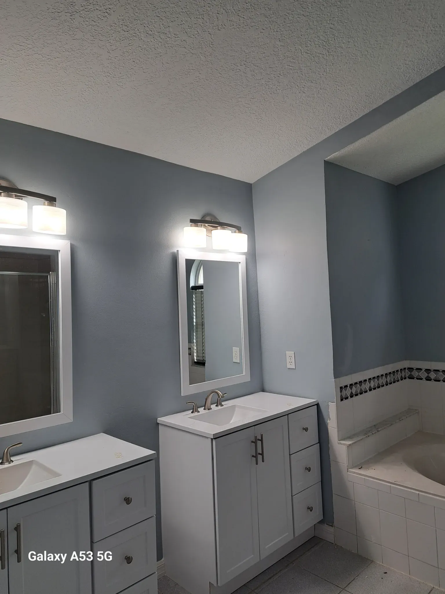 Drywall repair/ bathroom upgrade — after