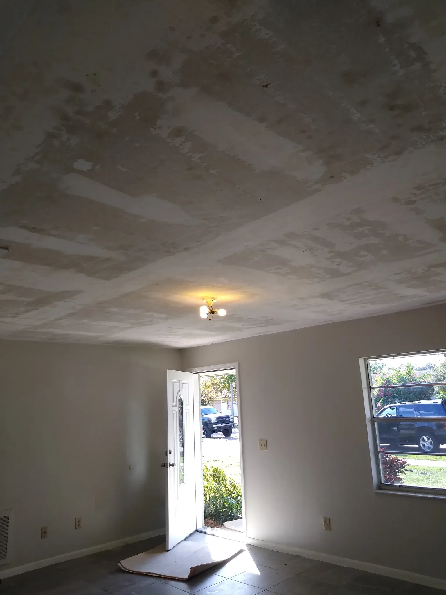 Popcorn removal/drywall repair — before